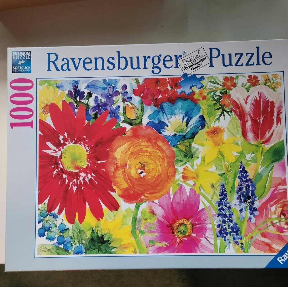 1000 piece Ravensburger puzzle "Abundant Blooms".
